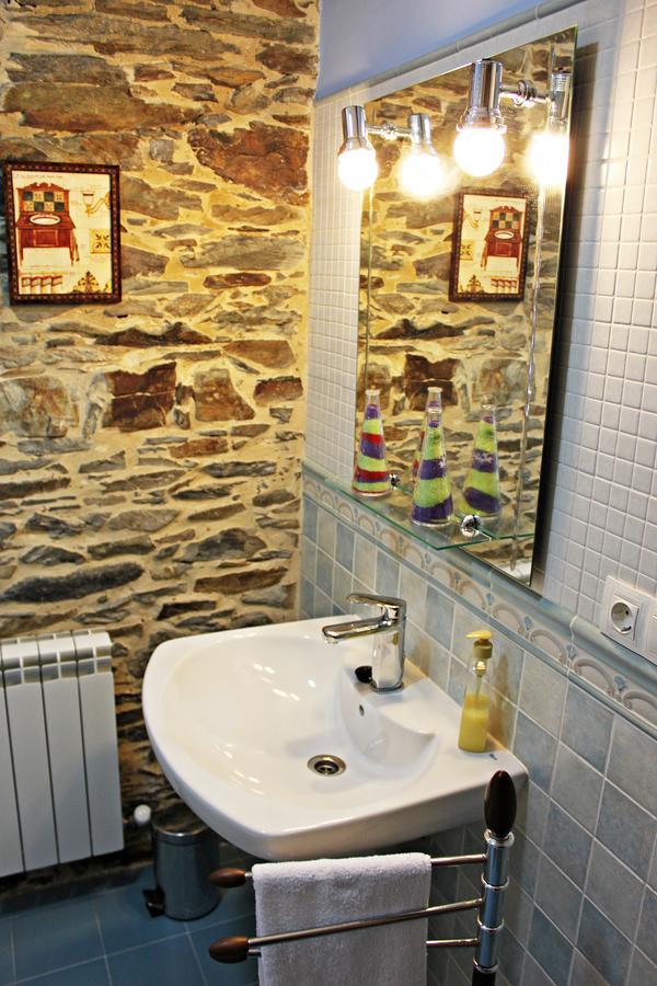 Apartamentos El Llago Boal Bagian luar foto