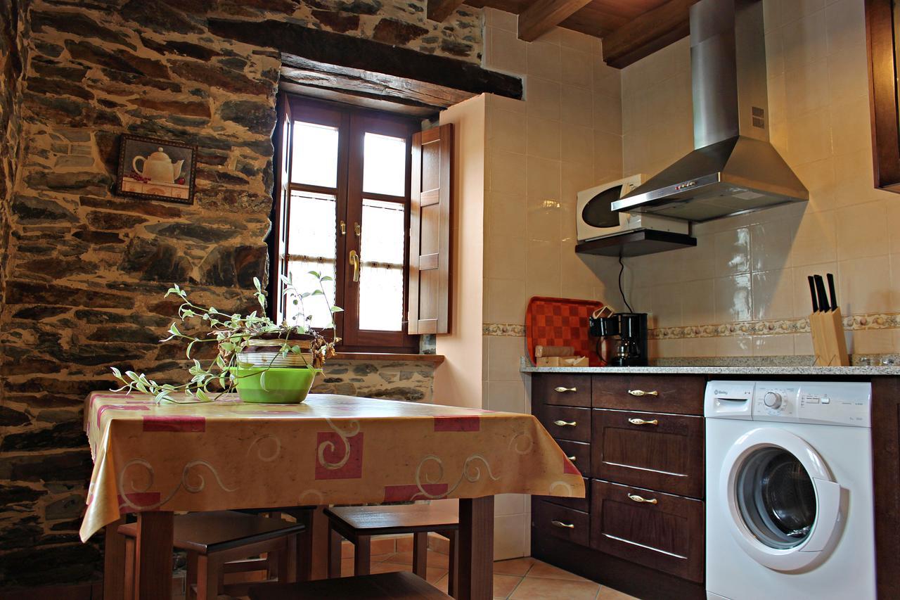 Apartamentos El Llago Boal Bagian luar foto