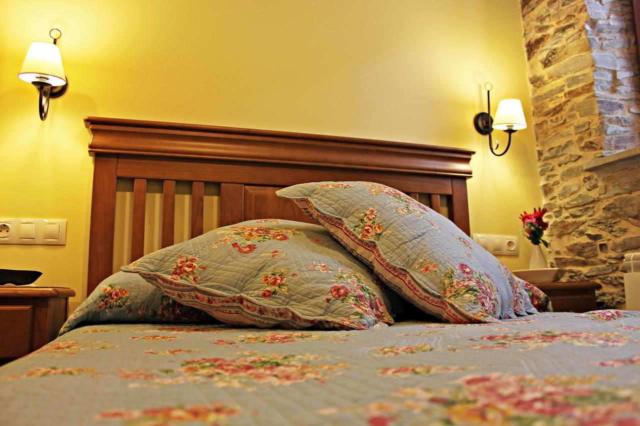 Apartamentos El Llago Boal Bagian luar foto