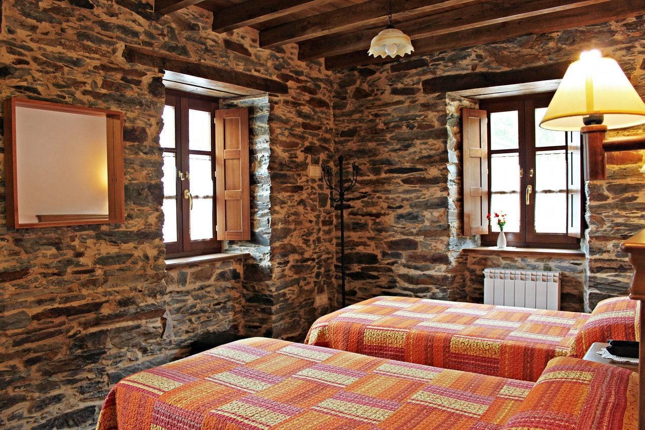 Apartamentos El Llago Boal Bagian luar foto