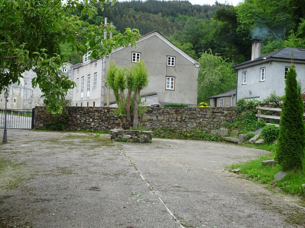 Apartamentos El Llago Boal Bagian luar foto